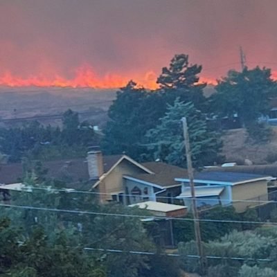 ‘Human-caused’ wildfire rips through major city in Nevada – as 90,000 residents told to flee
